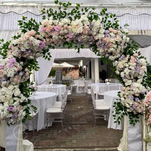 Floral arch at the entrance of a wedding reception
